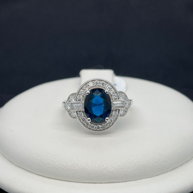1 ct Lab-Created Blue Diamond Oval Halo Ring in Sterling Silver