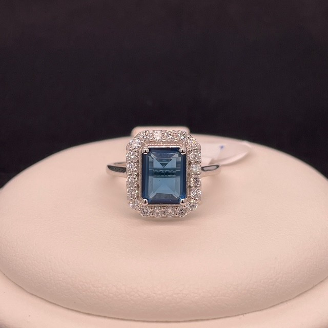 1 ct Lab-Created Blue Diamond Emerald-Cut Halo Ring in Sterling Silver