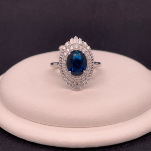 1 ct Lab-Created Blue Diamond Oval Baguette Halo Ring in Sterling Silver